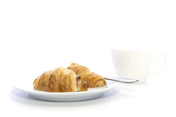 Croissant with cup of coffee — Stock Photo, Image