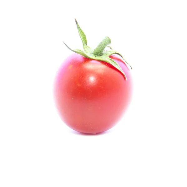 Tomato with green stick — Stock Photo, Image