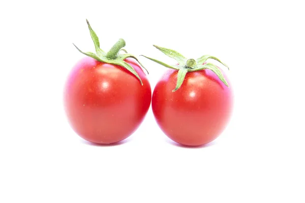 Tomaten mit grünen Stangen — Stockfoto