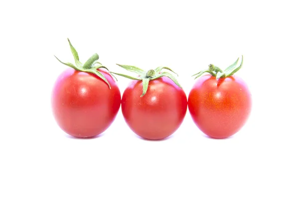 Fresh tomatoes in straight line — Stock Photo, Image