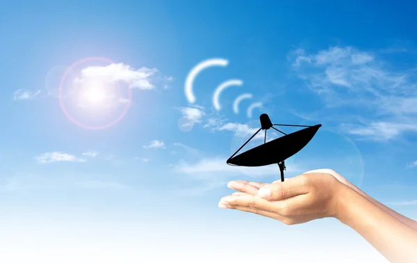 Satellite TV in the human hand — Stock Photo, Image