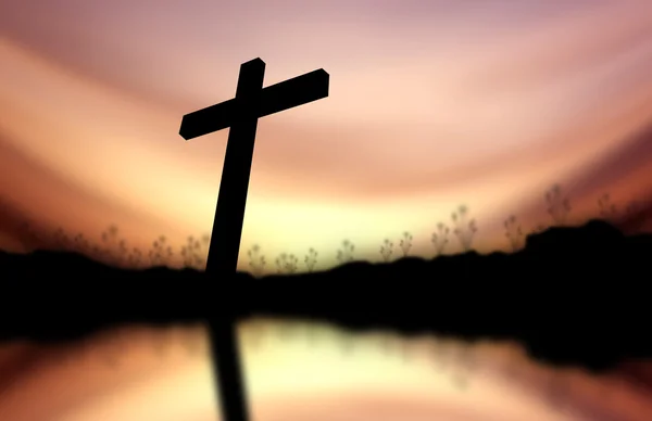 Cross silhouette reflected on water Sunset background — Stock Photo, Image