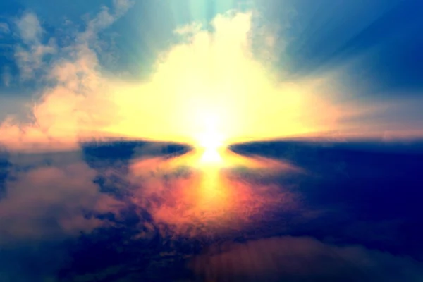 Light from the sun shining through the clouds in the sky. — Stock Photo, Image