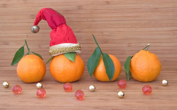 Tangerinas. tangerina em Santa hat . — Fotografia de Stock