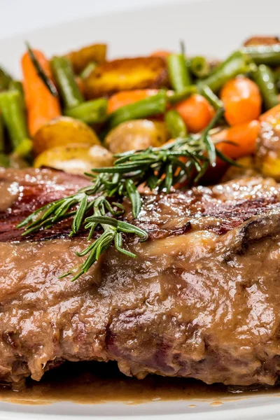 lamb shoulder blade with vegetables, potatoes and carrots finger-green beans, stewed with white wine and herb sauce