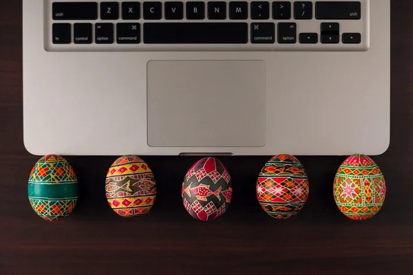 Easter eggs on macbook — Stock Photo, Image