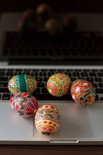 Easter eggs on macbook — Stock Photo, Image