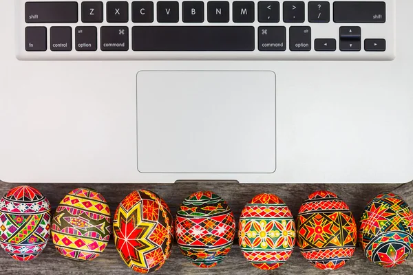 Easter eggs on macbook — Stock Photo, Image