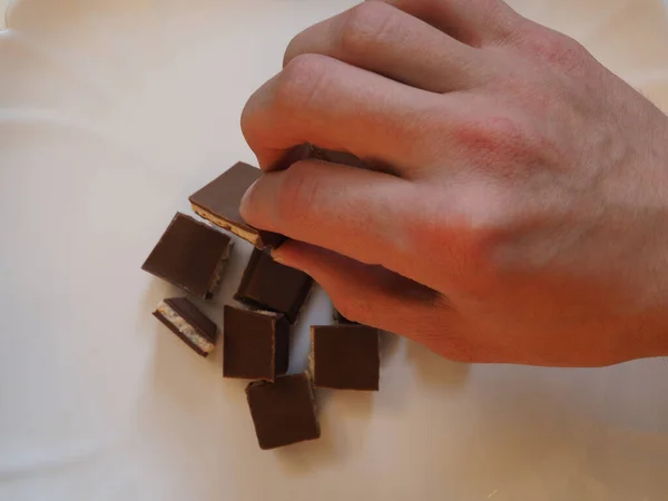 Man Holds Slice Chocolate His Hand — Stock Photo, Image