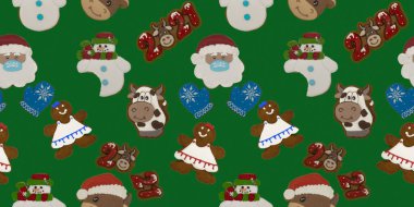 Yeşil arka planda Noel kurabiyesi. Kahverengi ev yapımı şekerli kurabiyelerle kusursuz tekrarlama kalıbı. Yeni yıl süsü el yapımı.