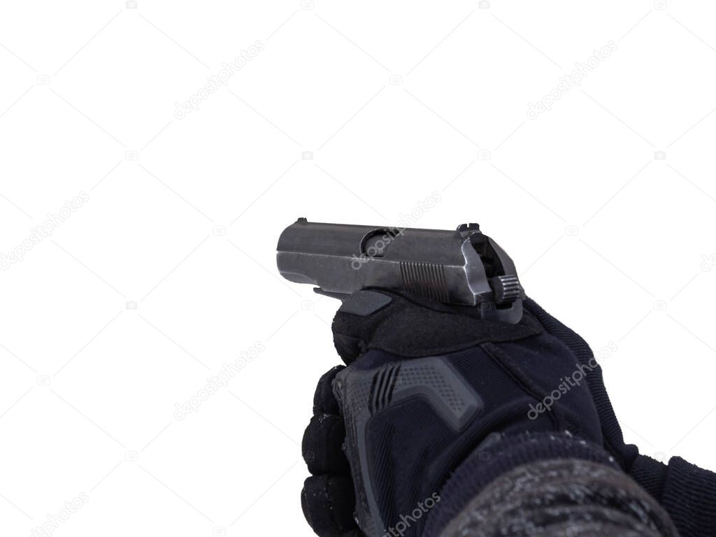 A male police officer in tactical black gloves holds a gun in his hands. The concept of criminal offense, robbery, murder, terrorist act, sports shooting.
