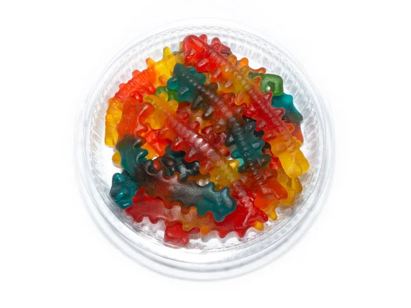 Vermes Marmelada Coloridos Substrato Plástico Recipiente Isolado Fundo Branco — Fotografia de Stock