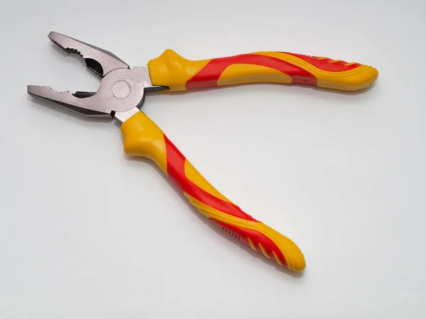 Modern New Pliers Yellow Red Rubber Handles Lie Table Top — Stock Fotó