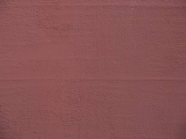 Çimentoyla kaplanmış sıva duvardaki koyu bir bordo boyanın dokusu. Kırmızı metal boyalı arka plan. Tasarım çalışması için arkaplan kavramı.