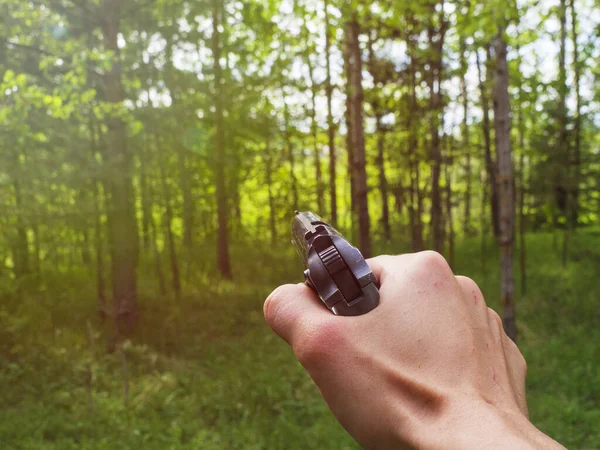 White Man Holds Black Police Pistol His Hand Background Green — Stock Photo, Image