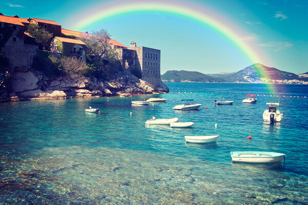 Sandy beach, sunny days, rainbow landscape and the Adriatic Sea