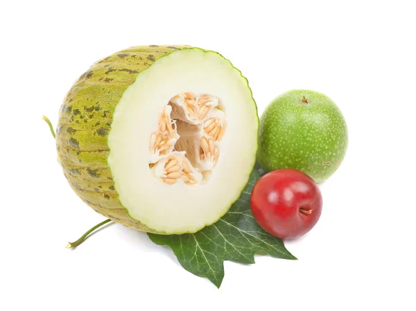 Sliced melon, green apple and  plum isolated on a white backgrou — Stock Photo, Image