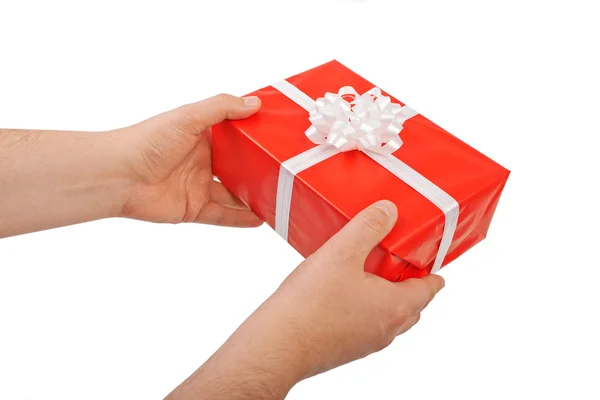 Red gift box in his hands, give, isolated on white background — Stock Photo, Image