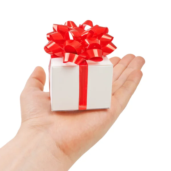 Red gift box in his hands, give, isolated on white background Royalty Free Stock Photos
