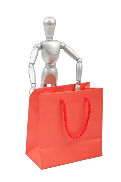 Silver mannequin human model with shopping bags in red on a whit — Stock Photo, Image
