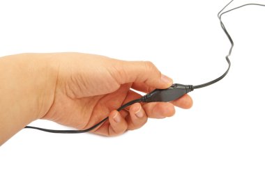 Hand holds the switch 