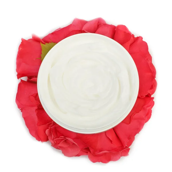 Cream on a bouquet of red roses — Stock Photo, Image