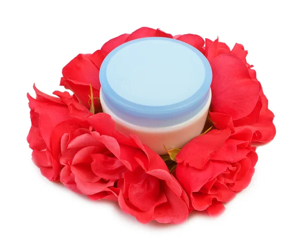 Cream on a bouquet of red roses — Stock Photo, Image