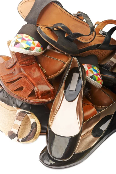 Ein Stapel Schuhe für Männer und Frauen — Stockfoto