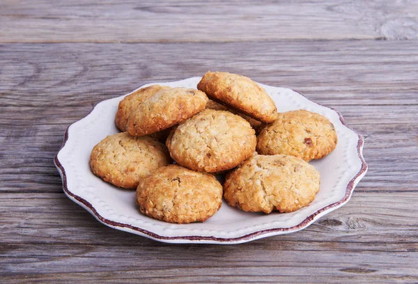 Oatmeal cookies tasty breakfast on the plate — Stock Photo, Image