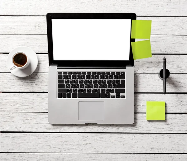 Laptop, coffee cup and sticky notes — Stock Photo, Image