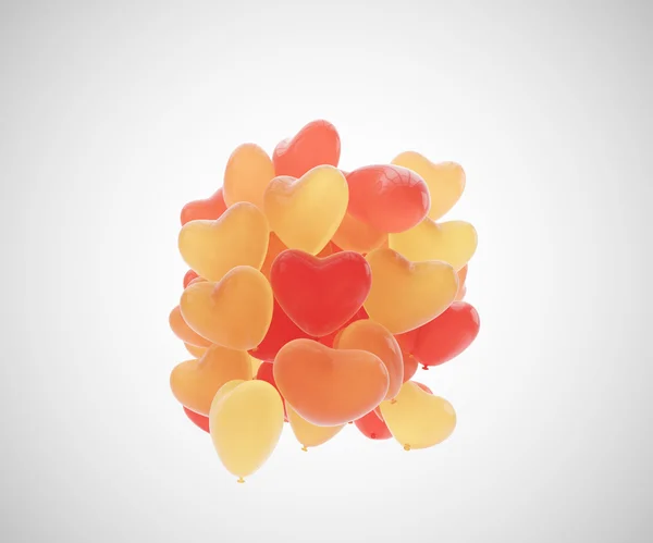 Un mucchio di palloncini a forma di cuore — Foto Stock