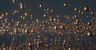 Altın toplar karanlık bir ayna arka planına düşüyor..