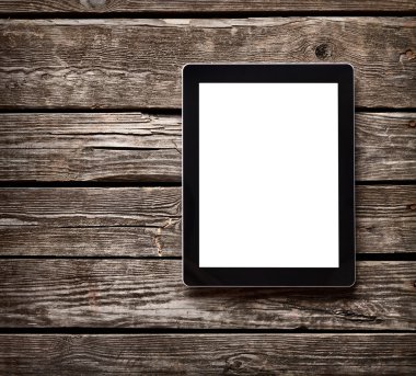 Tablet bilgisayar eski ahşap masa