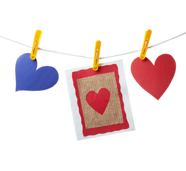 Card and two hearts on clothesline