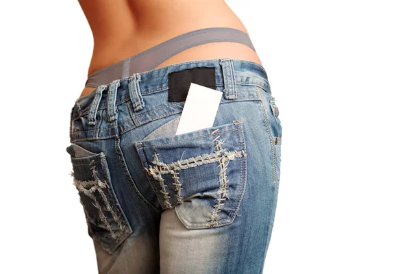 Mujer en jeans con tarjeta de visita — Foto de Stock