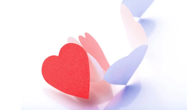 Paper hearts in chain — Stock Photo, Image