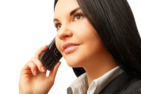 Woman smiling and talking by cell phone — Stock Photo, Image