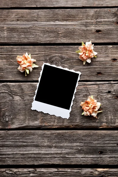 Instant photo with dried flowers — Stock Photo, Image