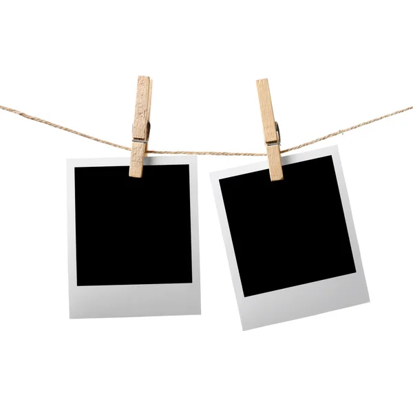 Two instant photos on the clothesline — Stock Photo, Image