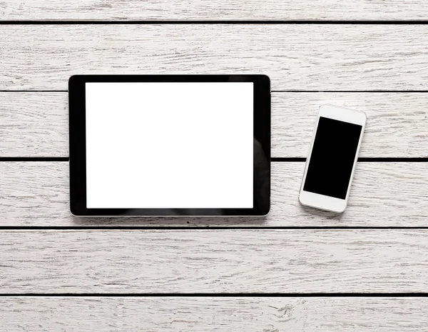 Tablet bilgisayar ve beyaz akıllı telefon