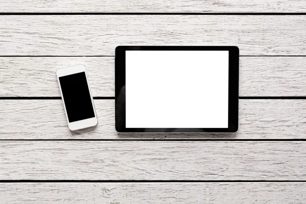 Tablet bilgisayar ve beyaz akıllı telefon