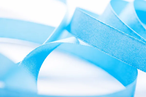 Closeup of curved ribbon on white — Stock Photo, Image