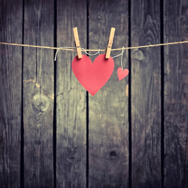 Two red hearts on the clothesline — Stock Photo, Image