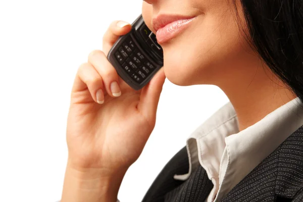 Woman smiling and talking by cell phone — Stock Photo, Image