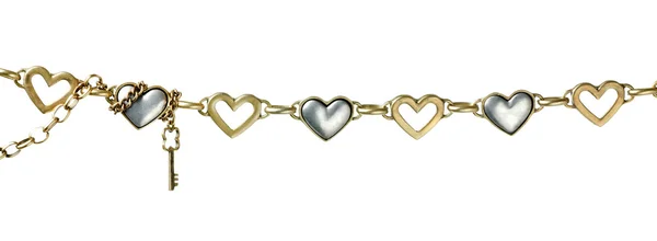 Gold chain with hearts and keys — Stock Photo, Image