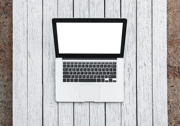 Open laptop on white wooden desk — Stock Photo, Image