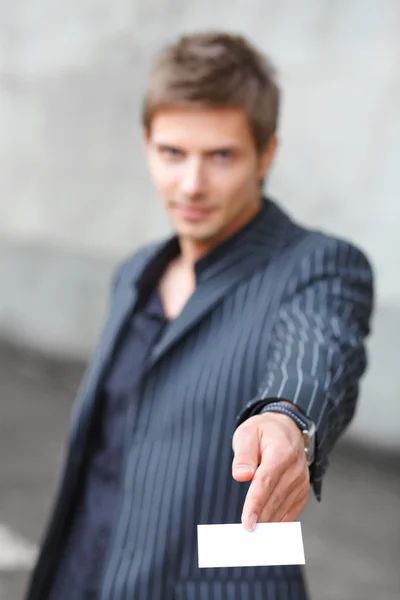 Businessman showing blank business card — Stock Photo, Image