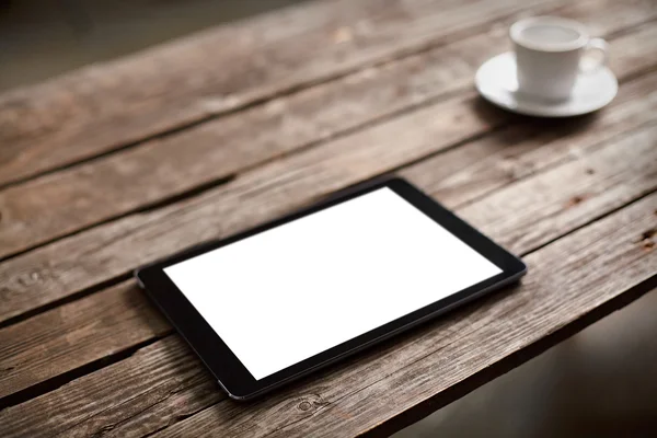 Digital tablet computer with cup of coffee — Stock Photo, Image