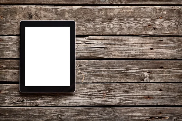 Digital tablet on old wooden desk — Stock Photo, Image