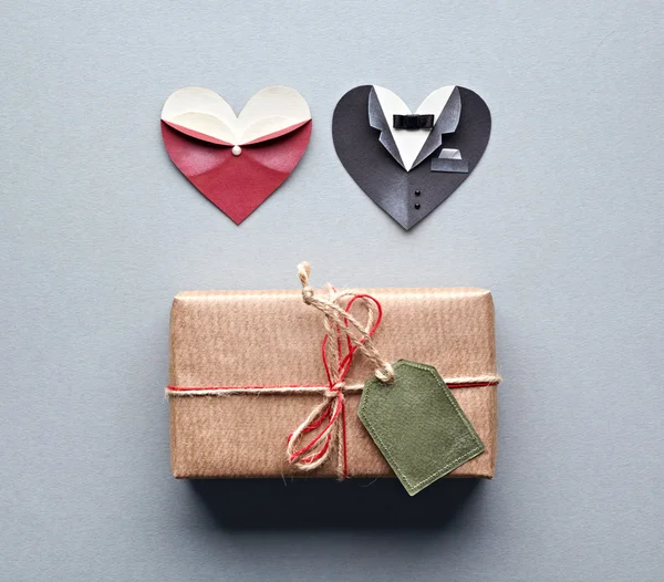 Gift box with symbolic heart shapes — Stock Photo, Image